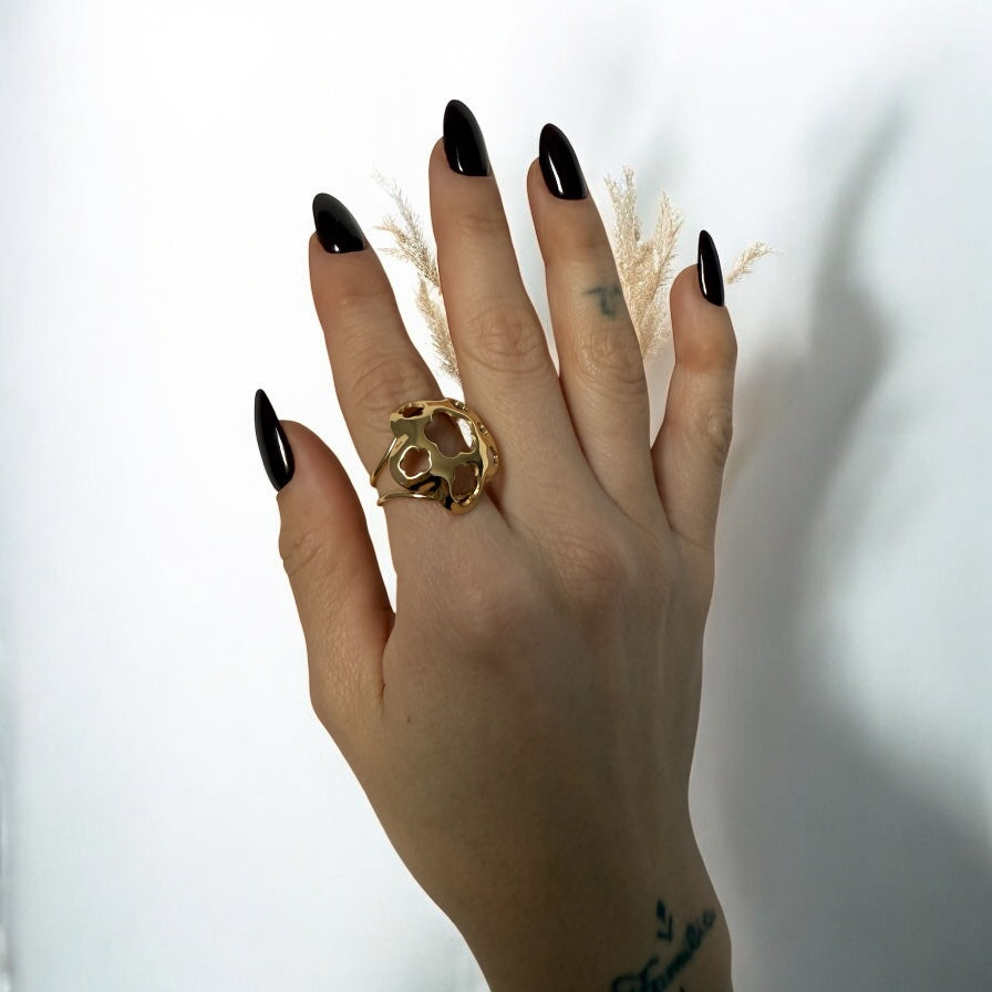 ANILLO FLOR AGUJEROS