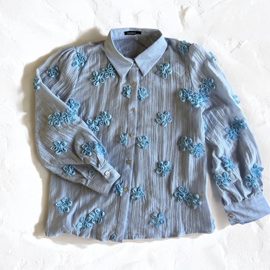 CAMISA TRANSPARENTE CON ROSAS