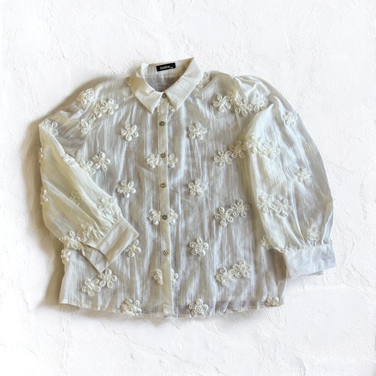 CAMISA TRANSPARENTE CON ROSAS